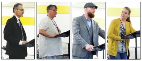 From left, Mark DeYoung, Sandra Bristol, Erick Sizemore and Kasie Cooper address the Harrison
Community Schools Board of Education
